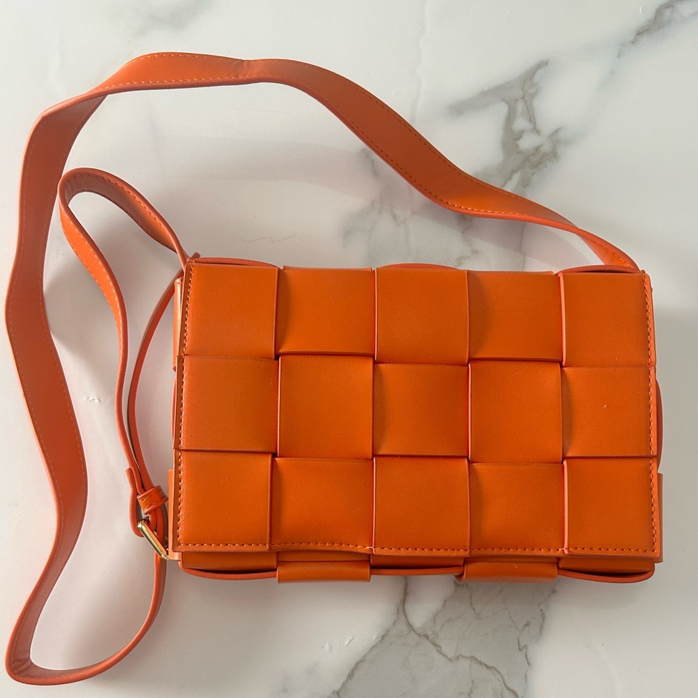 Faux leather orange weave clutch/crossbody bag